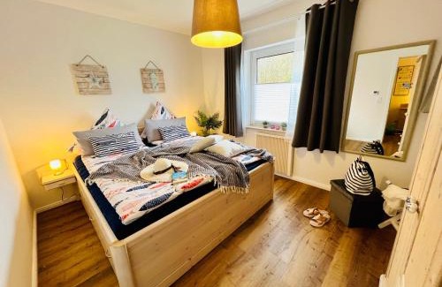 Schoenhagen Apartamento | SeeLund - Meeresrauschen lauschen - ruhiges sonniges Apartment mit Garten und Terrasse nahe Strand und Ostsee
