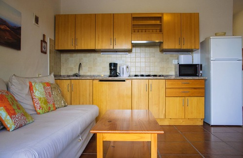 Tahiche Cabaña | Apartamento con jardín privado, piscina climatizada comunitaria, TV Satélite