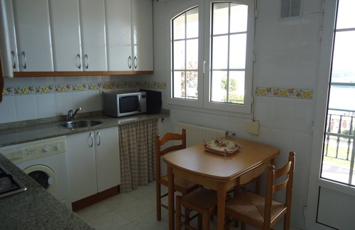 San Vicente de la Barquera Casa | Chalet pareado con jardín privado. Vistas espectaculares bahía y playas.
