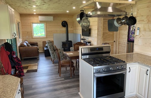 Prince County Cabaña | Semi-private beach, huge screened in deck, woods on fenced in property.