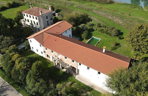 San Giorgio di Livenza Apartamento | Enviar apartamento 100m², planta baja, con piscina, alquiler de botes