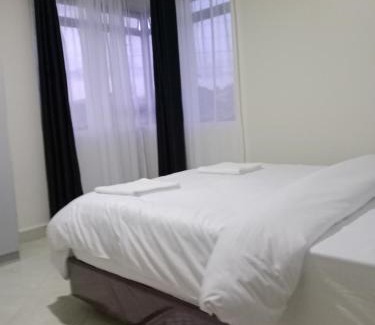 Ngelani Apartamento | Serene 2BR Getaway with Stunning Hill Views