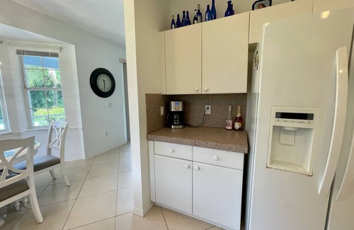 Bonita Springs Casa | Serene 3BD/2BA Home w/ Lanai overlooking Coconut Trees: 9 Mi to Beach!