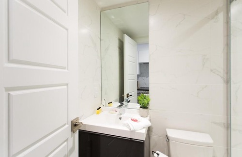 Little Italy Apartamento | Serene and Styled Little Italy Studio full bath by Den Stays