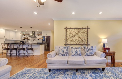 Dandridge Cabina | Serene lake views featuring a private dock, sun deck + spacious fire pit