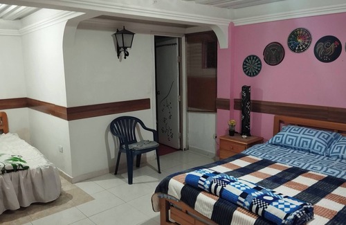 San Juan de Pasto Casa | Oasis sereno en Pasto Acogedora habitación con baño privado