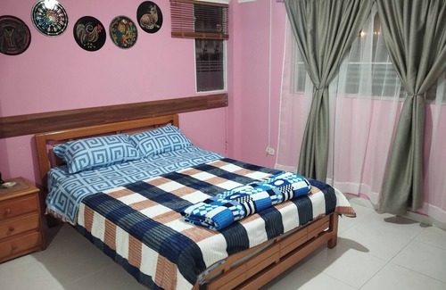 San Juan de Pasto Casa | Oasis sereno en Pasto Acogedora habitación con baño privado
