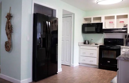 Port Saint John Casa | Serene Oasis: Saltwater Pool Home near KSC and Cocoa Beach"