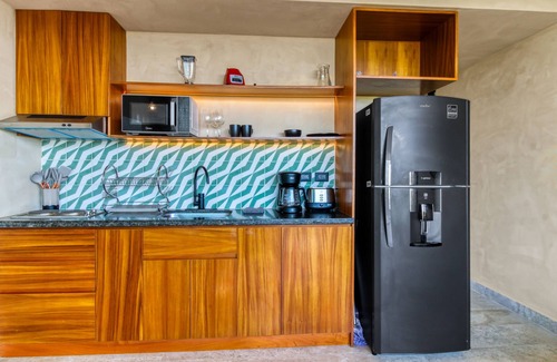 Tulsayab Apartamento | Serene retreat near beaches with an amazing pool, patio, & kitchenette