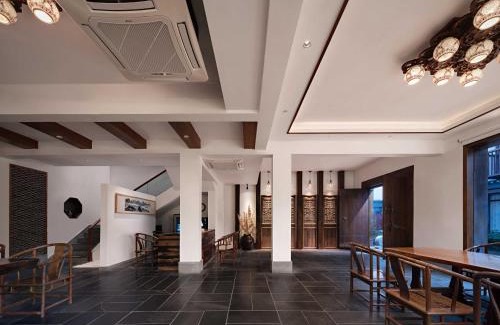 Diecai Hotel | Serene Vale Inn offers a complimentary one-way high-speed rail pickup service for guests staying two nights or longer