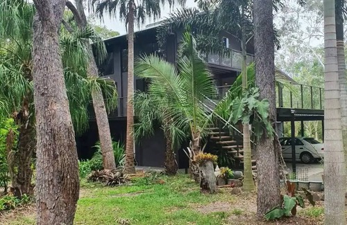 Agnes Water Apartamento | Serenity a Tropical oasis set on 4 acres of land with pool.