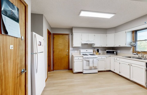 Buxton Casa | Serenity by the Lake-Spacious decks, peaceful retreat, and beachside bliss await