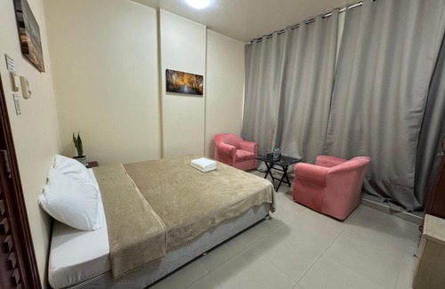 Al Ain Casa | Shared bath rooms only