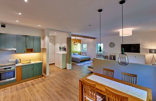Hohenaschau im Chiemgau Apartamento | Sicado-Loft vacation apartment 75 sqm, open-plan living room and bedroom, terrace