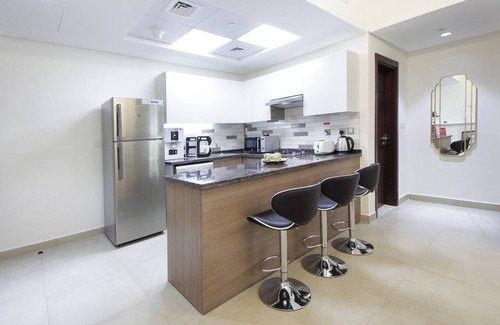 Discovery Gardens Apartamento | Silk Valley - Brand new 1B with pool view