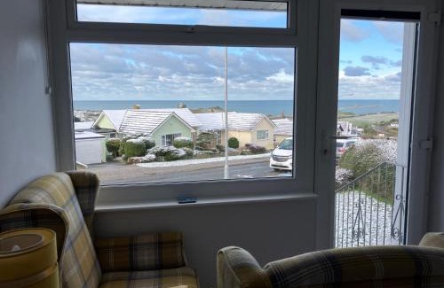 Porth Cama Y Desayuno | Sirens Sunset Peaceful Retreat with stunning sea views, 5 minutes from Porth Beach