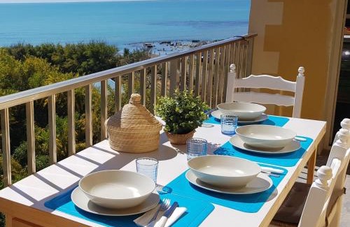 Caucana-finaiti-casuzze-finaiti Nord Apartamento | Sitting on the beach