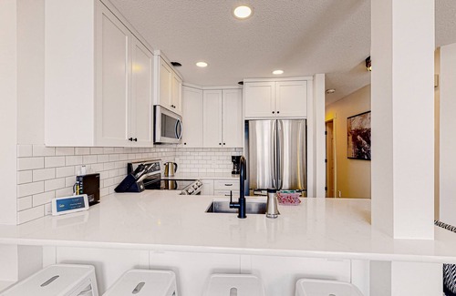 Snow Pine Estates Casa | Ski-in/out condo with mountain view, wifi, fireplace, & private washer/dryer