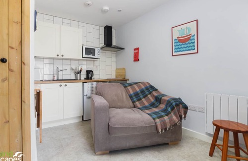Ballasalla Cabaña | Small, but perfectly formed encapsulates this one up, one down maisonette in the small village of Ba