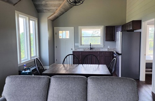 Brooks Casa | Small cottage house, centered on 100 acres surround by hills, lake, and cattle.