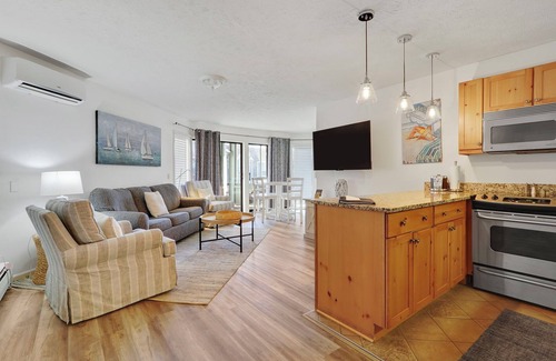 Charlevoix Condominio | Suite de lujo con un toque de hogar en el centro de Charlevoix.