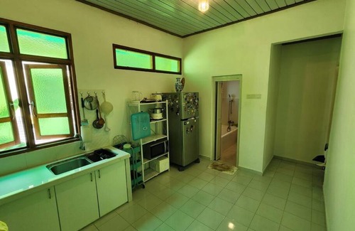 George Town Casa | Small Green Bungalow in Balik Pulau