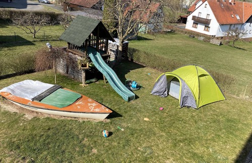 Nieder-Werbe Condominio | Small vacation apartment (65m²) with "beautiful view" Garden with playground