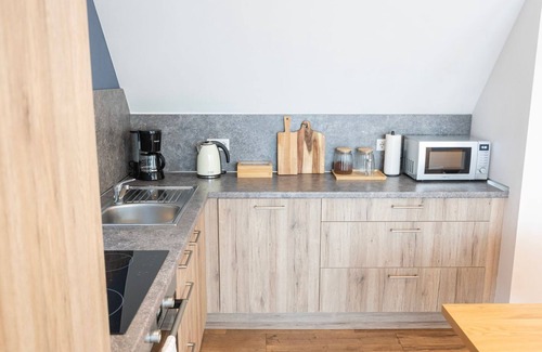 Bad Zwischenahn Apartamento | SmartFewo: Haus Luft | Penthouse | Sauna | Park - Residence by the small sea
