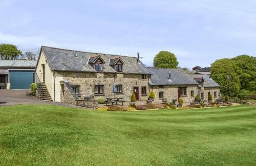 Hawkridge Casa | Smiddy Cottage, Historic Village Hub with Spacious Lounge, High Ceilings, and Wood Stove