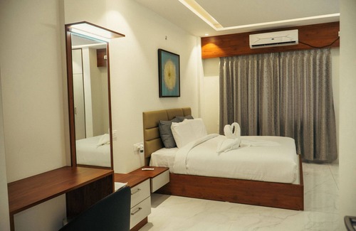 Agara Hotel | Snap Inn Rooms By The Buzz House