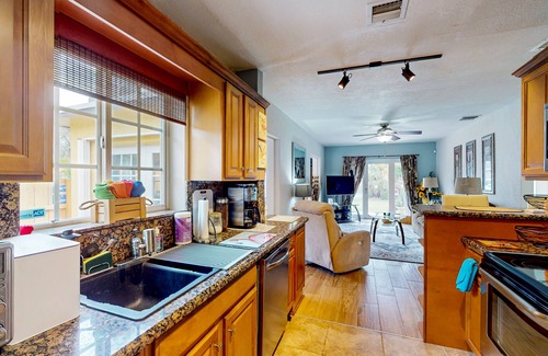South Middle River Casa | Snowbird-friendly home with enclosed backyard, grill, patio, streaming, W/D, AC