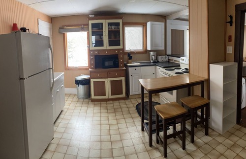 Patten Casa | Snowmobile trail access. Room for multi-vehicle/trailer parking.