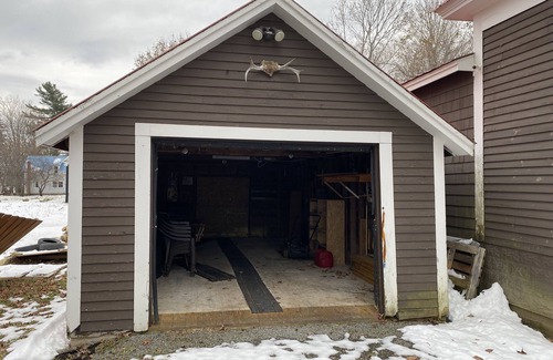Patten Casa | Snowmobile trail access. Room for multi-vehicle/trailer parking.