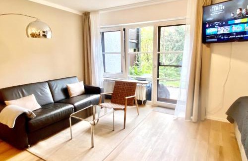 Worthsee Apartamento | Snug Stays 2 - Design 1-Zimmer-Studio am See mit Terrasse, Garten, Badestelle vor dem Haus
