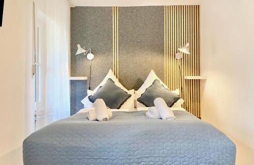 Worthsee Apartamento | Snug Stays 2 - Design 1-Zimmer-Studio am See mit Terrasse, Garten, Badestelle vor dem Haus