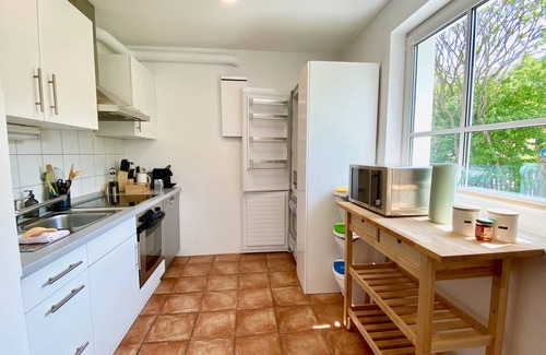 Wessling Condominio | Snug Stays: Design apartment for 4 people on Lake Wessling with garden I Ammersee