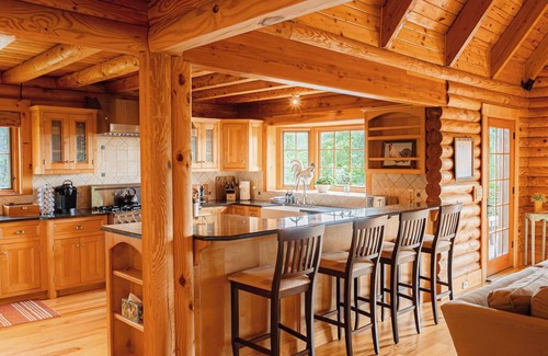 Meadows Of Dan Cabina | Soak in the hot tub @ Stonewood Manor - Where Luxury and Cozy Meet.