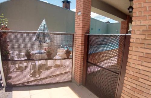 Caraguatatuba Casa | Sobrado com piscina em condomíno fechado a 150 M da praia