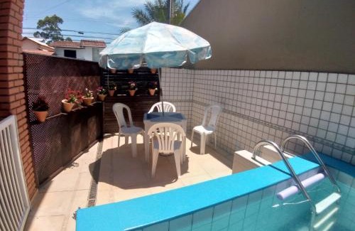 Caraguatatuba Casa | Sobrado com piscina em condomíno fechado a 150 M da praia