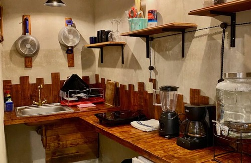 Chichen Itza - Valladolid Apartamento | Sol: Suite moderna con cocina y piscina