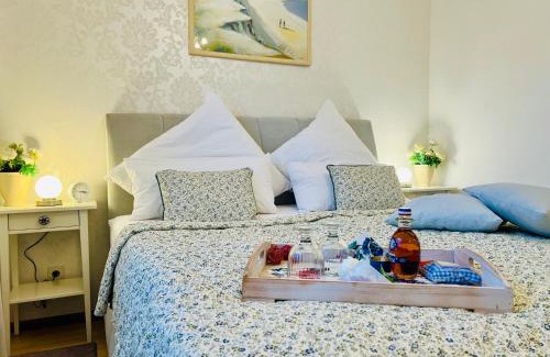 Schoenhagen Apartamento | SommerLund - macht Laune auf Meer - Ruhige und sonnige Ferienwohnung mit Terrasse und Garten nahe Strand und Ostsee