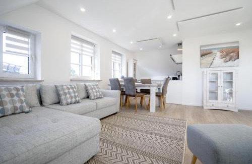 Suederhafen Apartamento | Sonnenglück - Helle und moderne Ferienwohnung am Meer