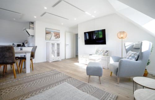 Suederhafen Apartamento | Sonnenglück - Helle und moderne Ferienwohnung am Meer