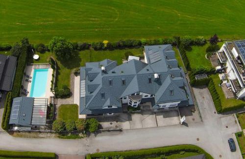 Seekirchen am Wallersee Casa | "SONNTAGSGLÜCK" - Premium Apartments Seekirchen, ruhiges Feriendomizil im Grünen, gemeinsamer Poolarea