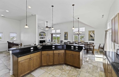 Wind Over Waves Casa | Soundside Dog Friendly w/ Pool, Elevator, Hot Tub, Game and Theater Rooms