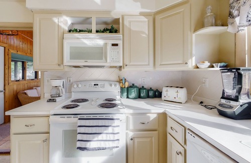 South Bethany Harbor Casa | South Bethany canal-front house w/ grill, boat dock, and outdoor shower