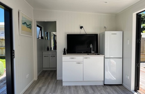 Pauanui Casa | La casa de playa clásica - con un toque moderno.