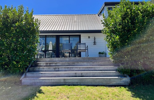 Pauanui Casa | La casa de playa clásica - con un toque moderno.