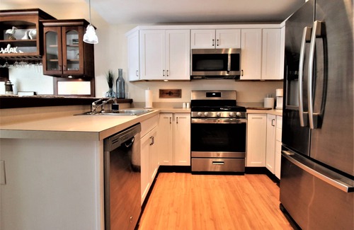 South Haven Condominio | South Haven Condo w/ pool by the Black River, restaurants, shops & beaches!