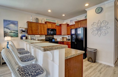 Wilmington Beach Casa | Southern Belle Disfrute de los vientos del sur y espectaculares vistas desde el porche